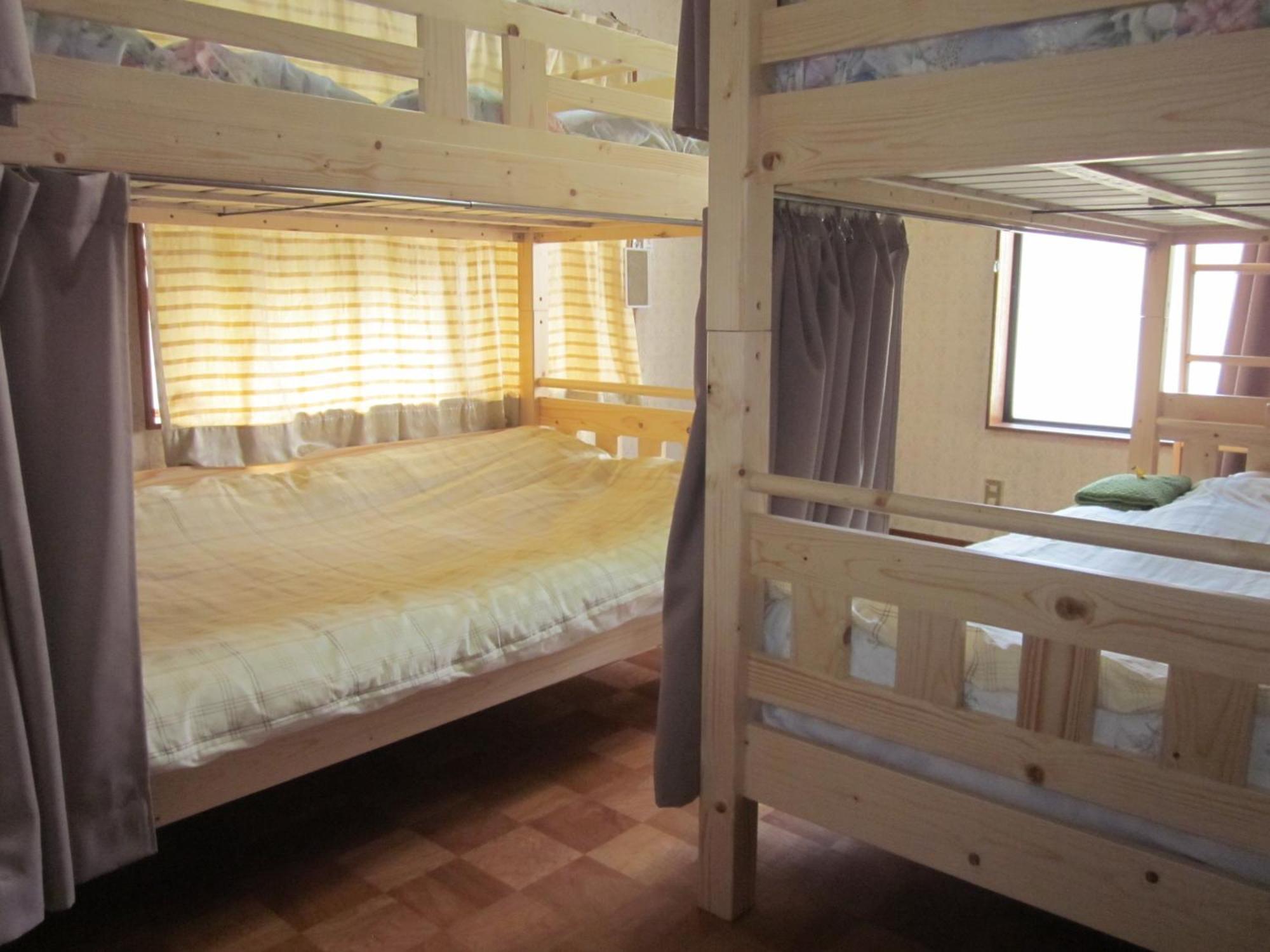 Enman Guest House Osaka Moriguchi Rum bild
