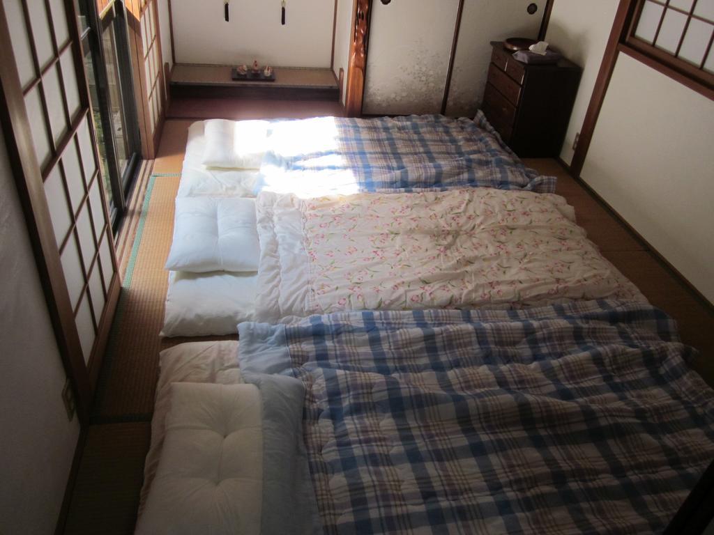 Enman Guest House Osaka Moriguchi Exteriör bild