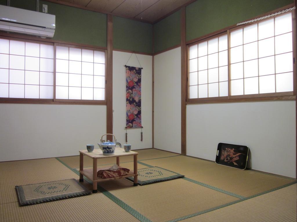 Enman Guest House Osaka Moriguchi Exteriör bild